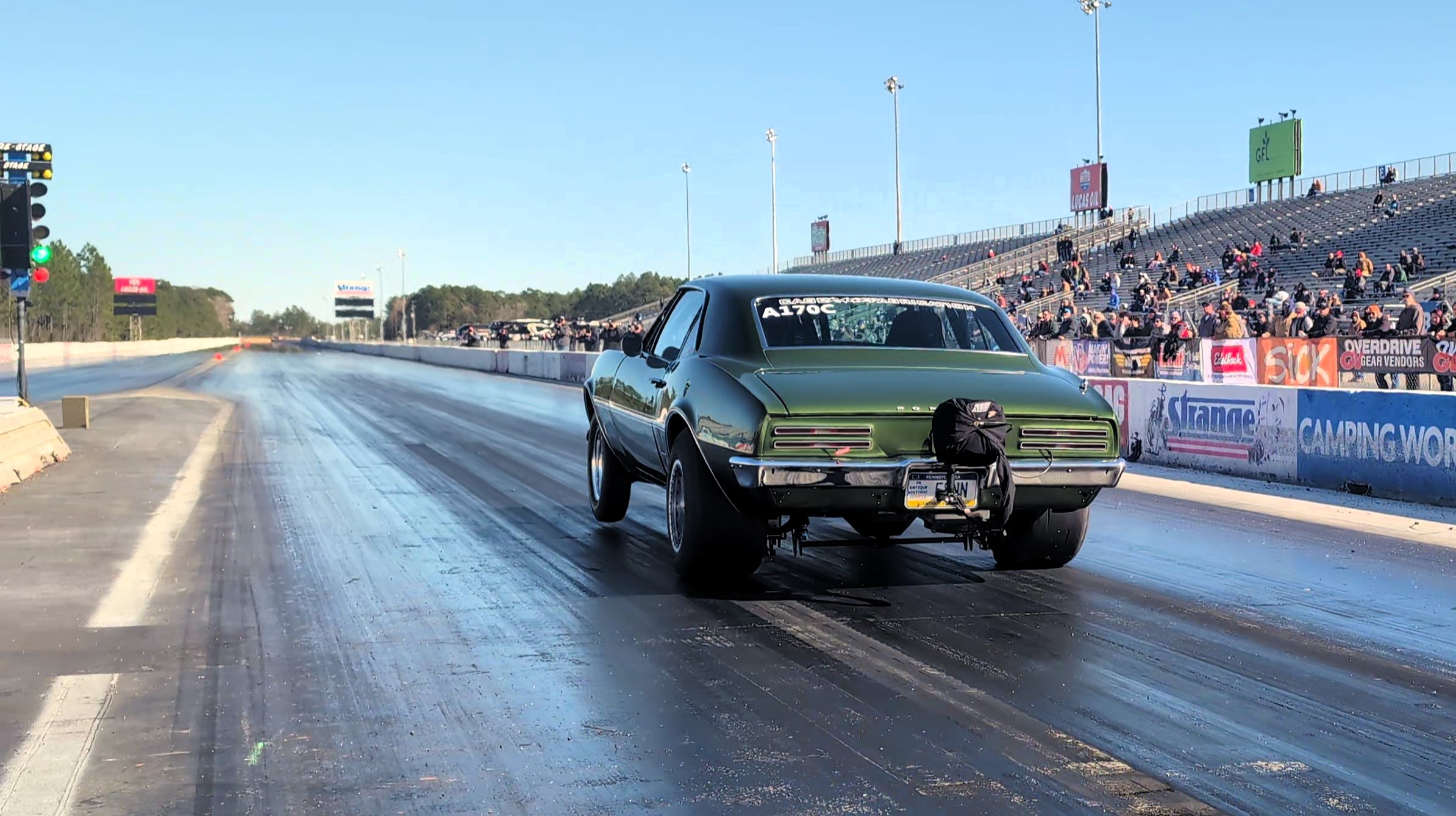 Vehicle on drag race track